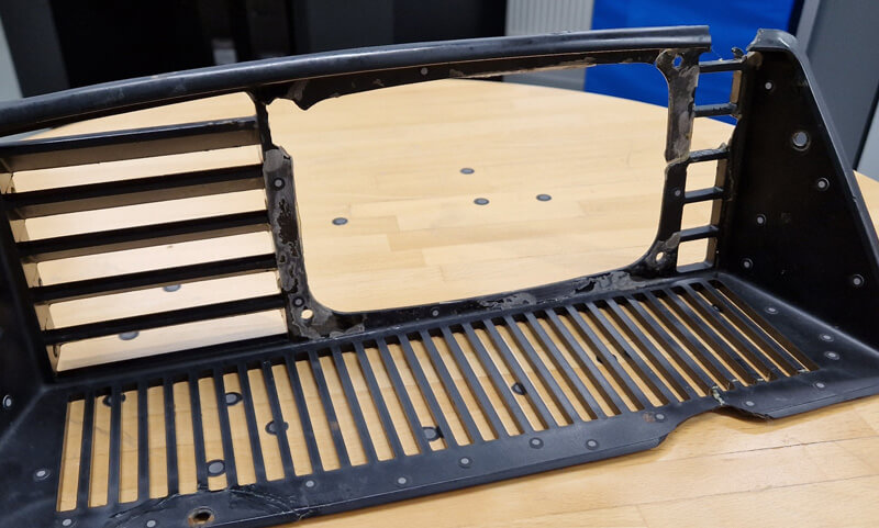 Den trasiga skotergrillen.